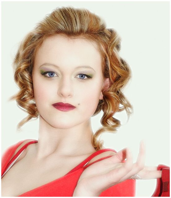 young girl holding shoes